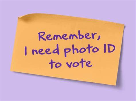 post it note saying remember i need photo ID to vote