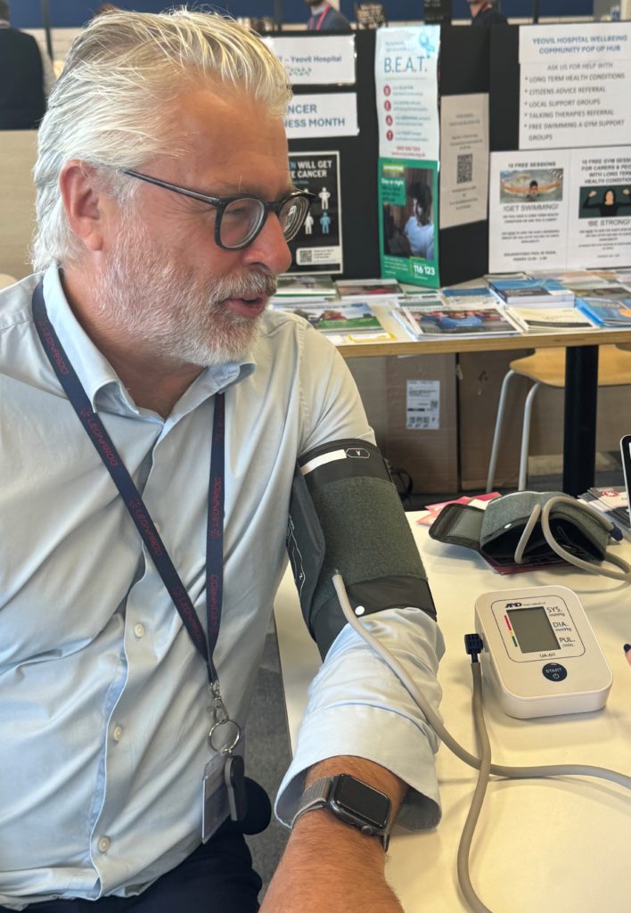 Leonardo staff member Darren Potter having his blood pressure checked