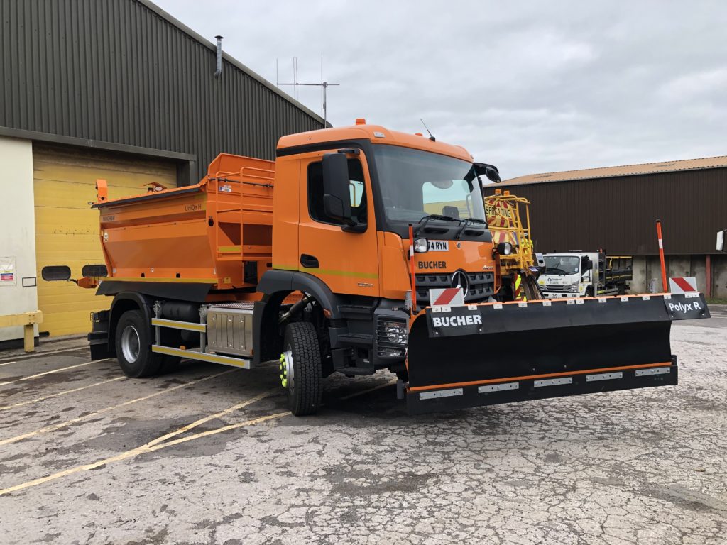 Photo of orange road gritter